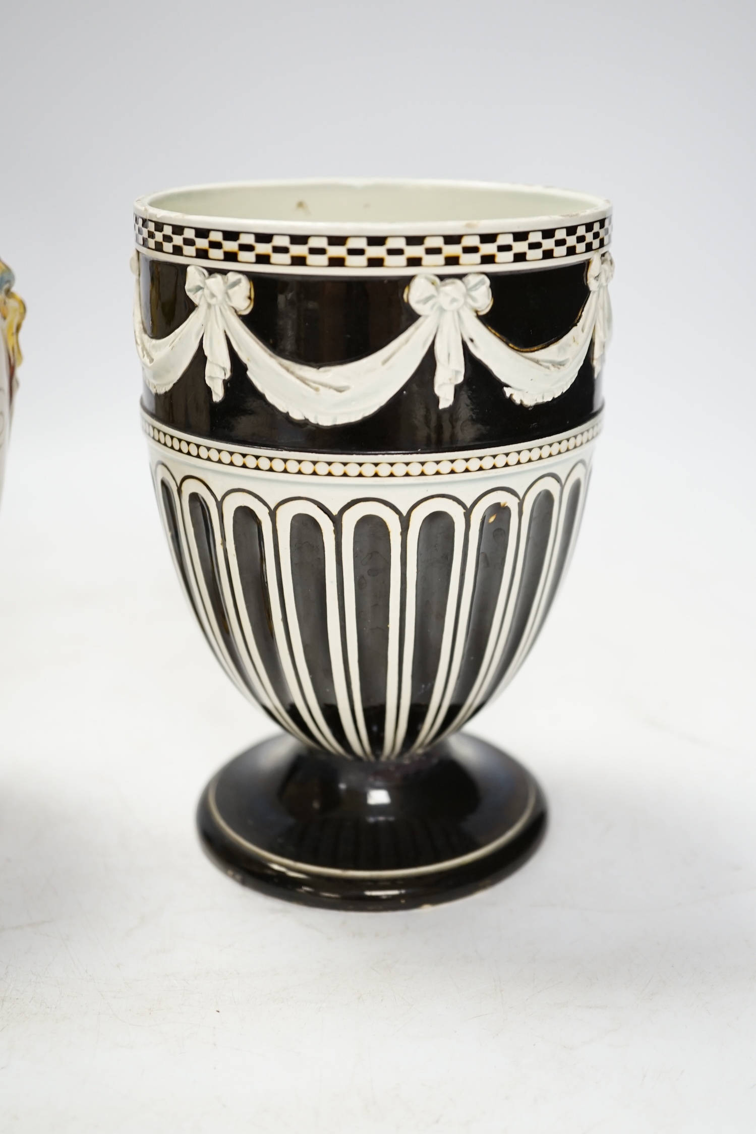 A Wedgwood pot and faience glazed jug and a Cantagalli maiolica pearl glazed jug, 26cm. Condition - poor, losses to upper rim of Cantagalli jug and restoration to base of Wedgwood